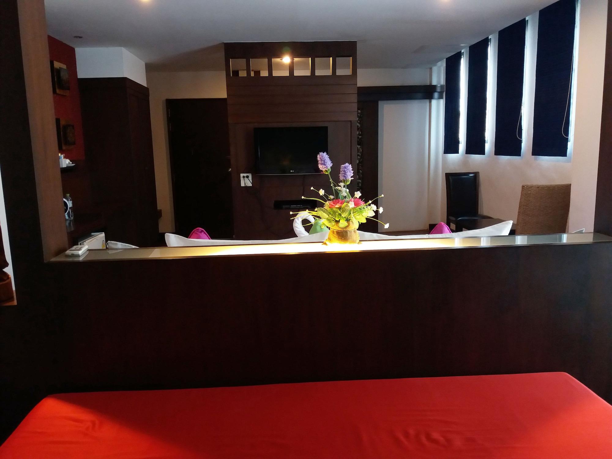 โรงแรมณิชา สวีท โรงแรม